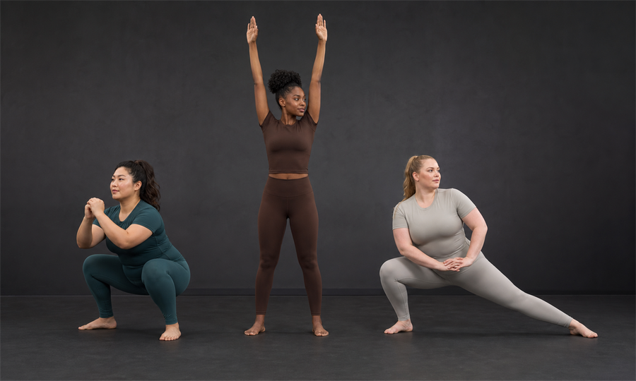 Three women demonstrating squat raise and stretch fit proof